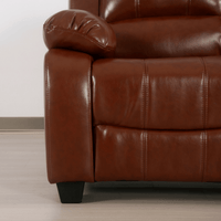 Brown leather recliner chair on a wooden floor with a neutral background