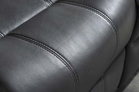 Verona sofa Close-up of a dark gray leather seat with stitching details