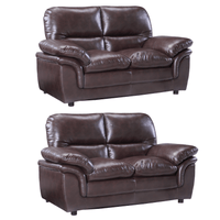 Two brown leather sofas on a white background