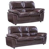 Two brown leather sofas on a white background
