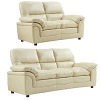 Two beige leather sofas on a white background