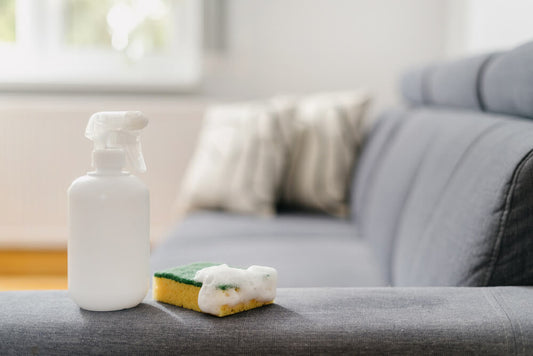 How to Clean a Fabric Sofa with 7 Easy Methods. Cleaning equipment on a fabric sofa to clean.