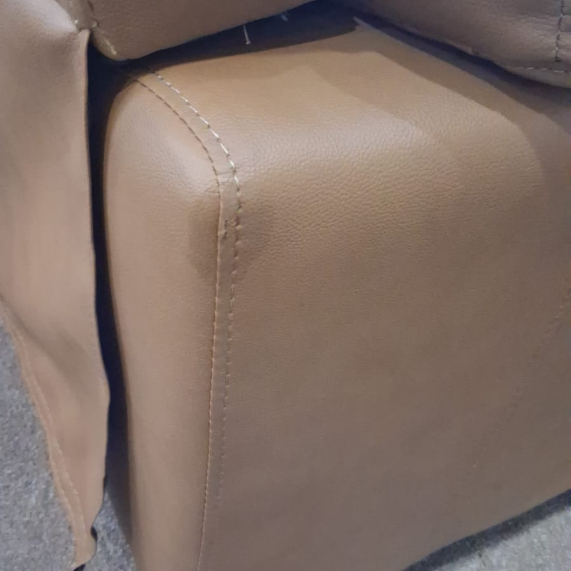 close up of caramel genuine leather sofa