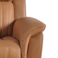 Close-up of a brown leather armchair on a white background