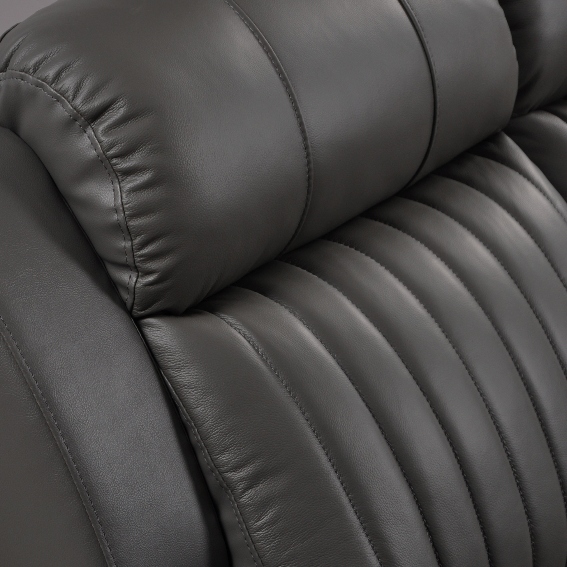 Close-up of the Cidliano 2-seater sofa highlighting fabric texture, stitching, and cushion detailing.