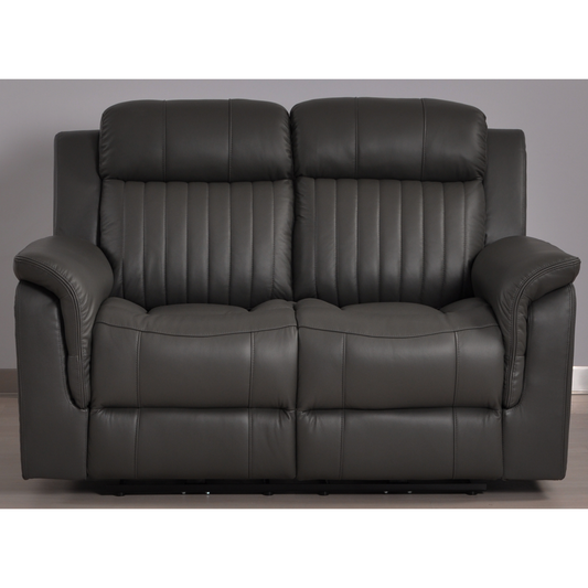 Cidliano 2-seater sofa front-facing in a contemporary roomset with stylish decor and warm, inviting lighting.