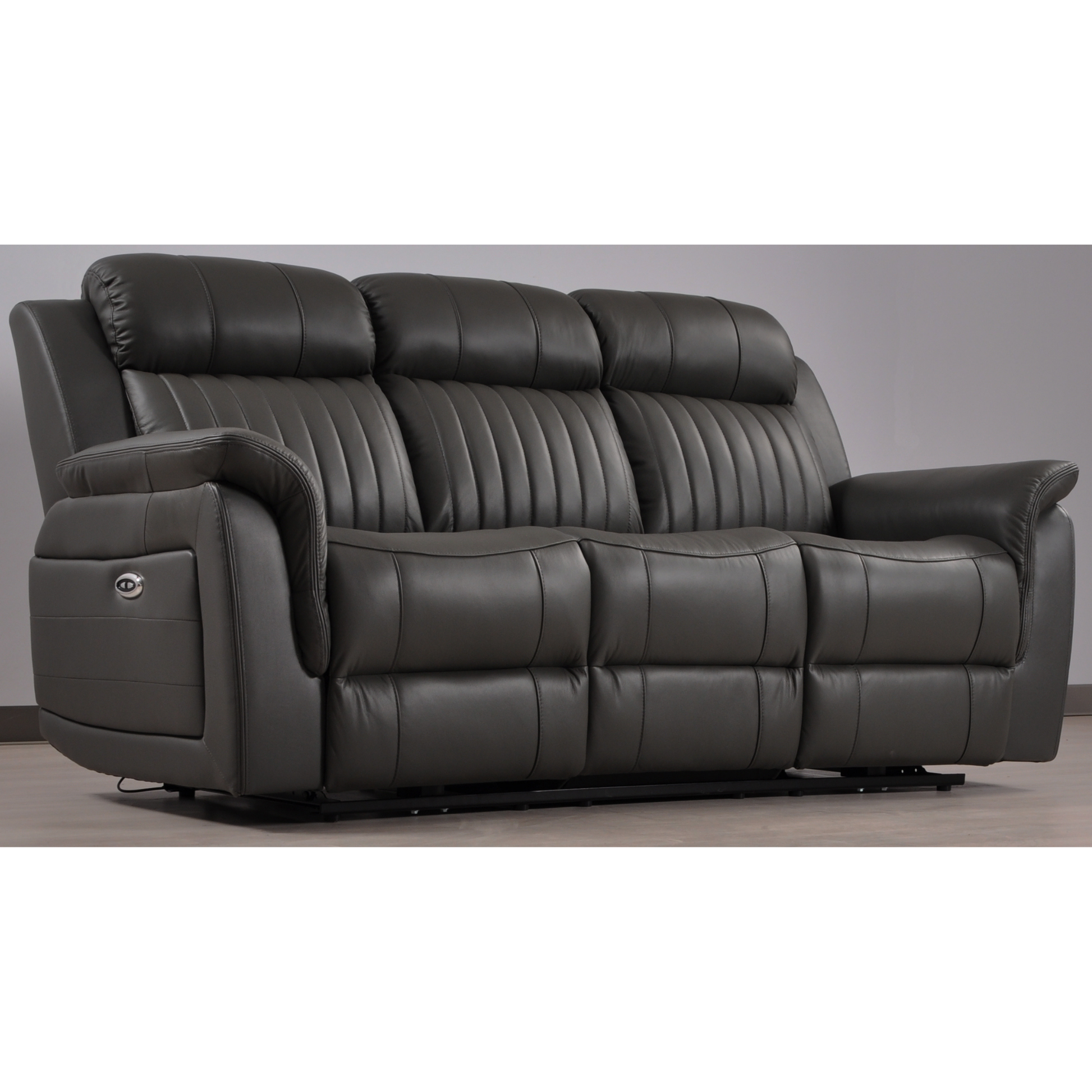 Cidliano 3-seater sofa angled in a modern roomset with elegant decor and warm ambient lighting.