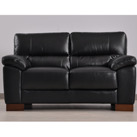 Dalmore Black 2 Seater – front-facing black two-seater sofa in a modern living room setting.
