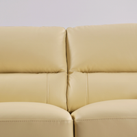 Dalmore Cream 2 Seater – close-up of cream-colored two-seater sofa showing texture and design details.