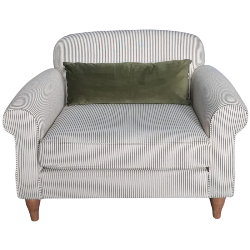 Cream fabric armchair on a white background