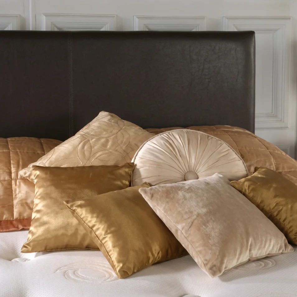 close up of headboard of brown leather bed