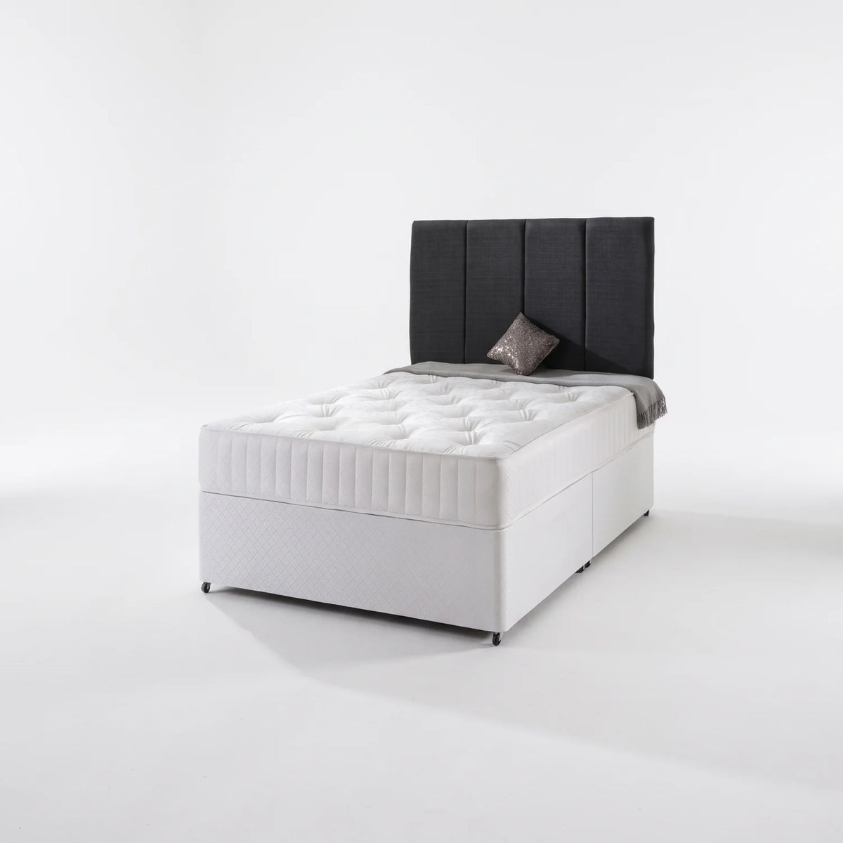 charcoal grey bed in a white background