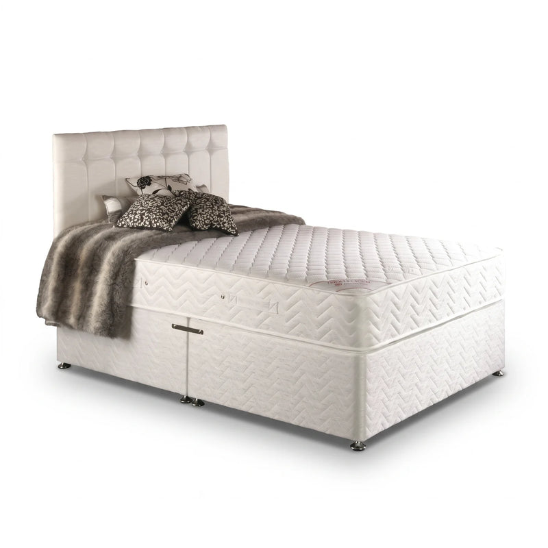 white fabric bed in a white background 