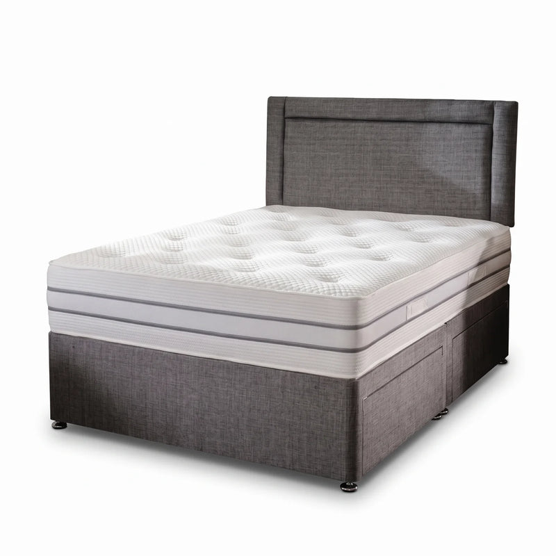 Grey fabric bed in a white background