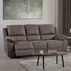 Maple Brown reclining sofa in a living room setting with a coffee table and abstract painting.