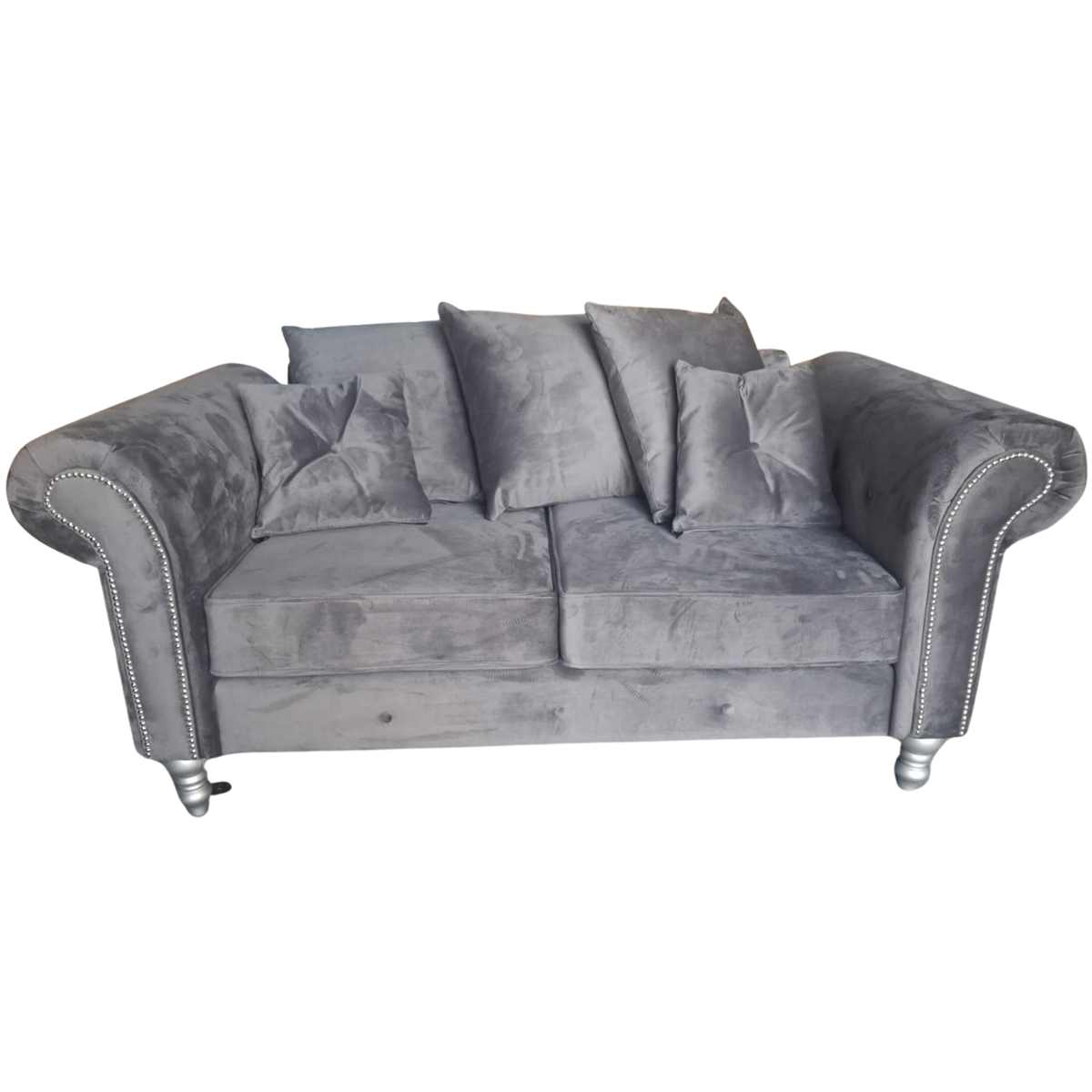 A gray velvet loveseat sofa with rolled arms, silver nailhead trim, and silver-toned legs, shown against a plain white background.