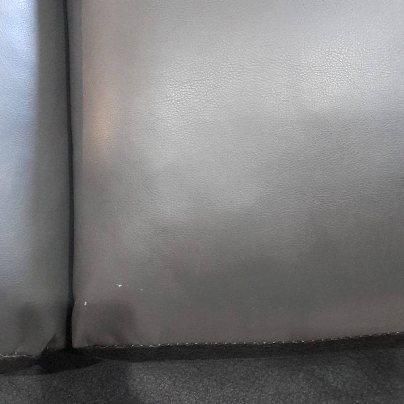 close up of outlet leather grey 3 seater sofa