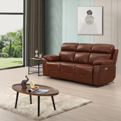 Renato tan three-seater sofa in a modern living room setting, styled with neutral décor, soft lighting, and contemporary furnishings.