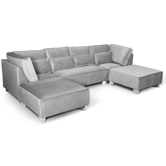 Gray sectional sofa with ottoman on a white background