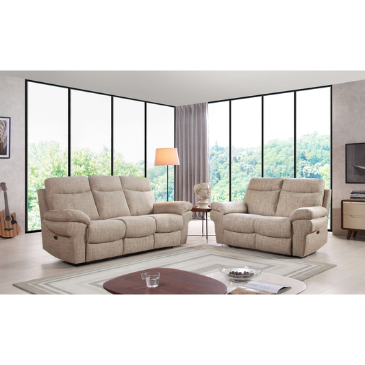 Beige reclining sofa set in a modern living room with large windows.
