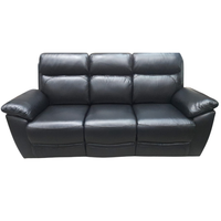 Black leather sofa on a white background