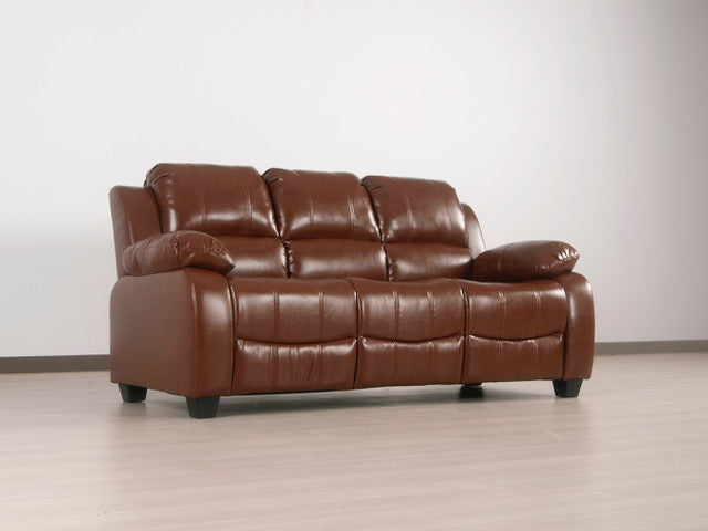 Three-quarter angled view of the tan leather-Aire sofa from the right side in a studio setting.
