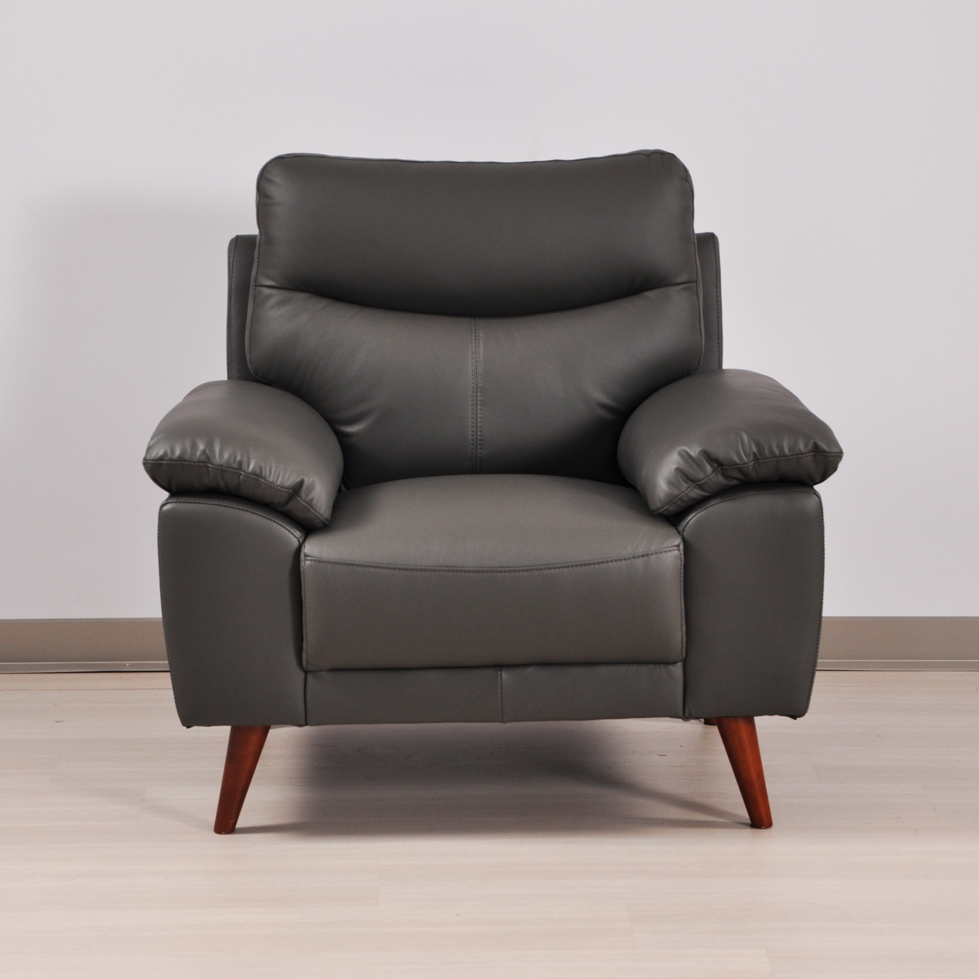 Vantage Grey Armchair in roomset, front-facing, modern design, stylish and comfortable seating