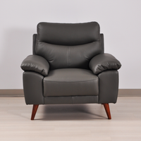 Vantage Grey Armchair in roomset, front-facing, modern design, stylish and comfortable seating