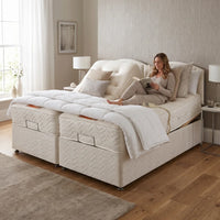 cream electric bed in a room setting 