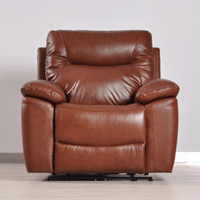 Brown leather recliner chair on a light wooden floor with a neutral background