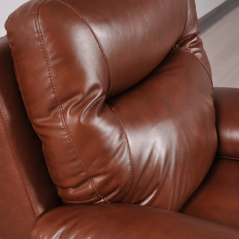 Close-up of a brown leather armchair