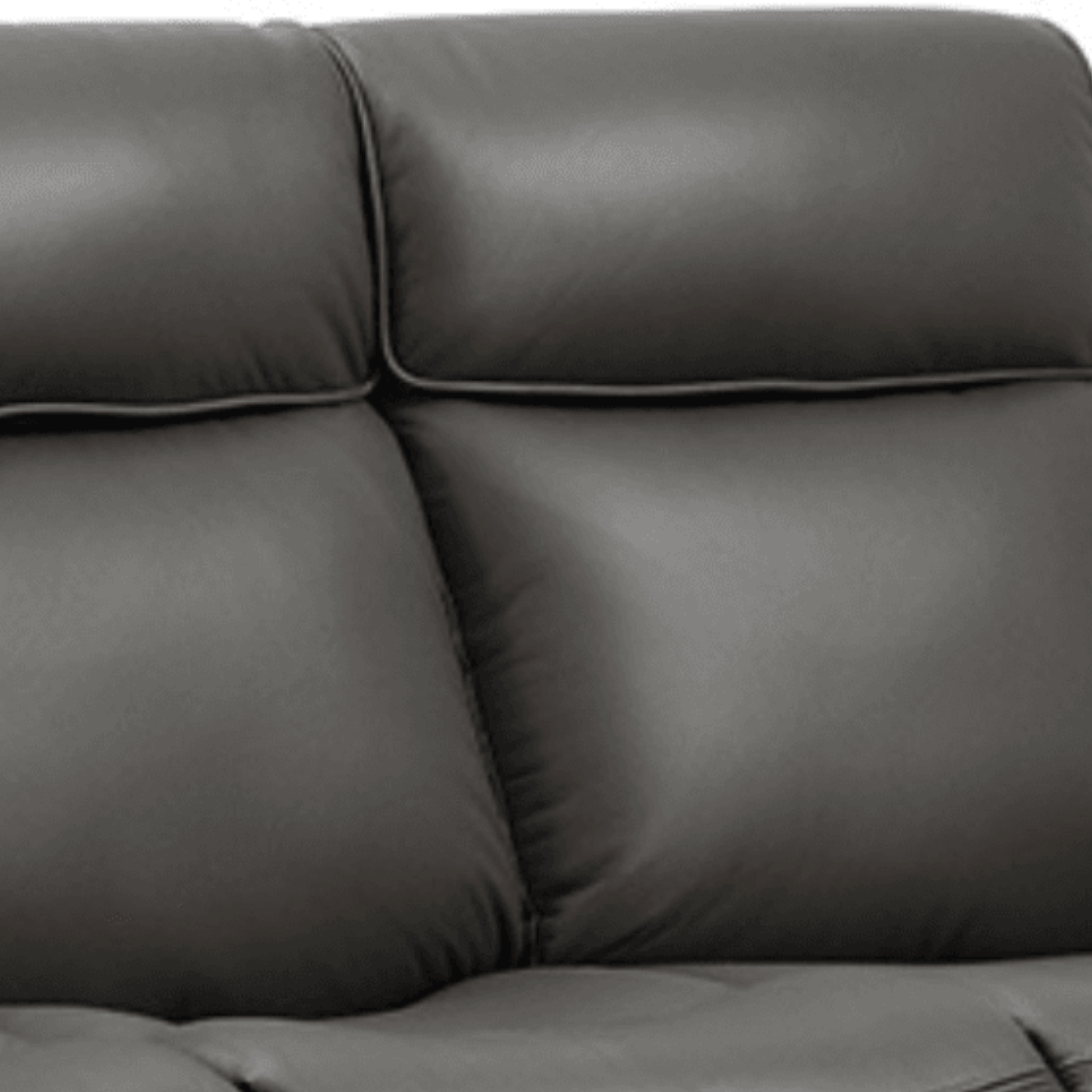 Gray leather sofa with a close-up view of the cushions.