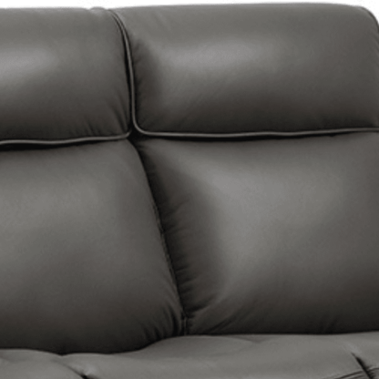 Gray leather sofa with a close-up view of the cushions.