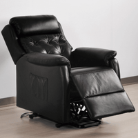 Black leather recliner chair on a light wooden floor with a white wall background