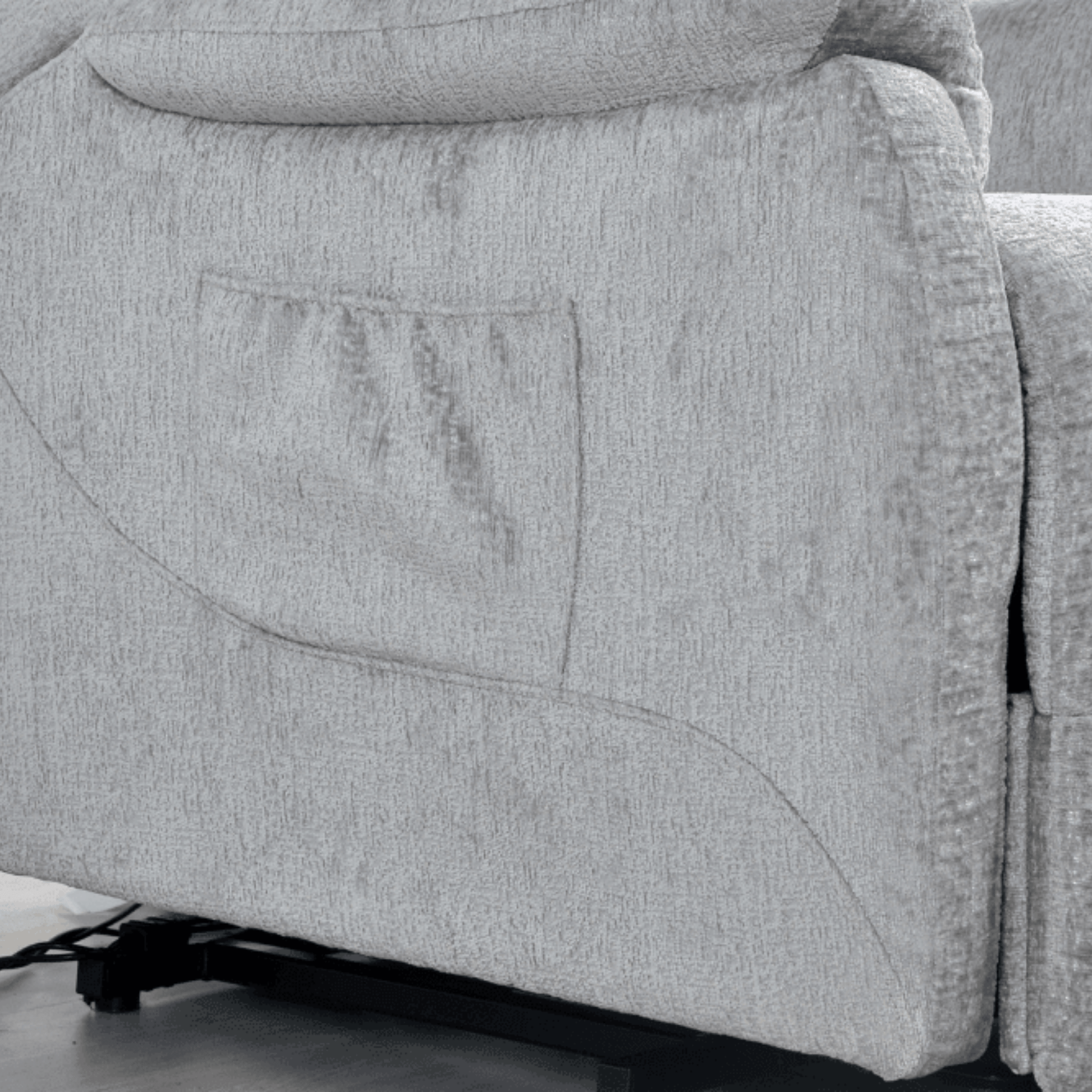 Gray fabric sofa with visible stitching details