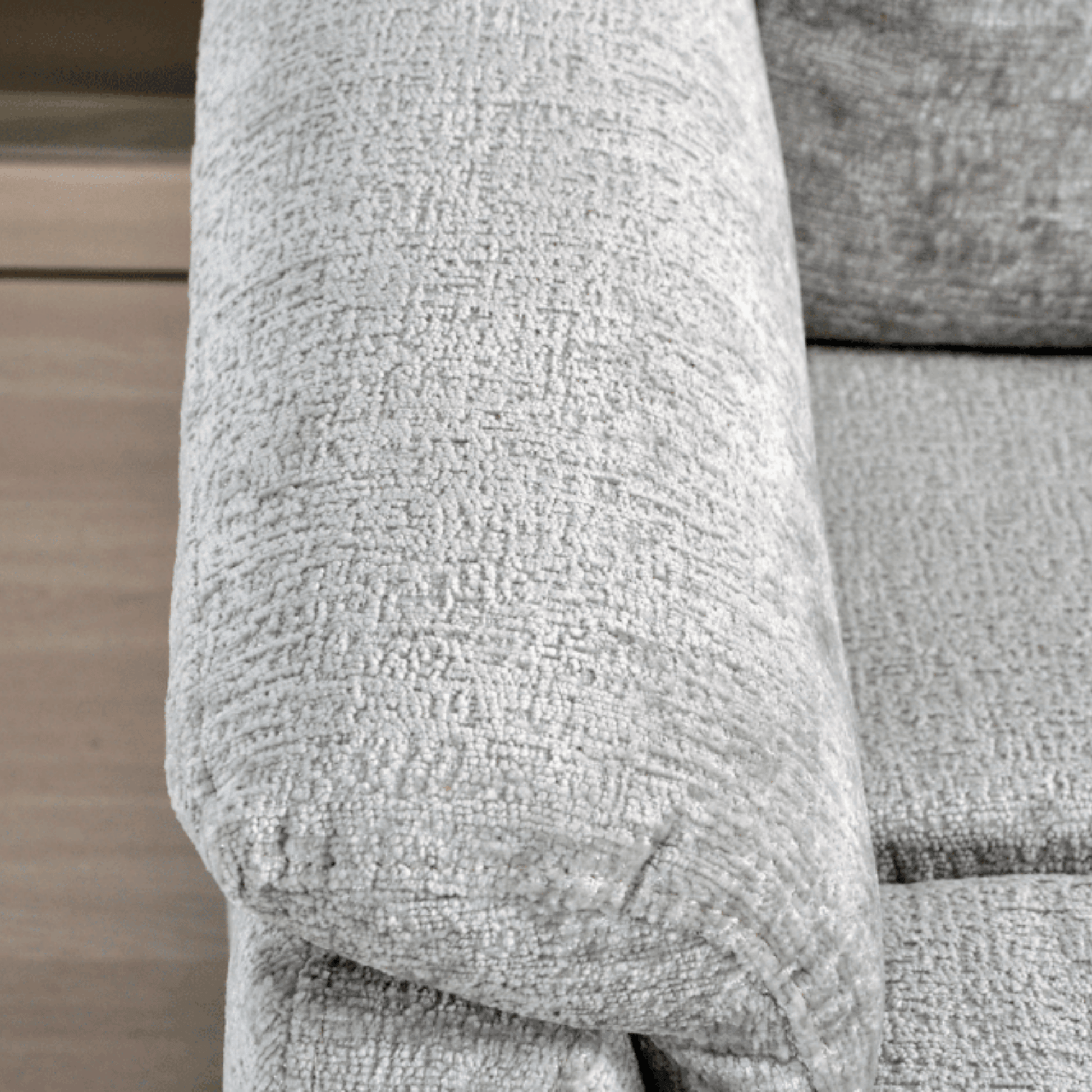 Close-up of a textured gray fabric surface