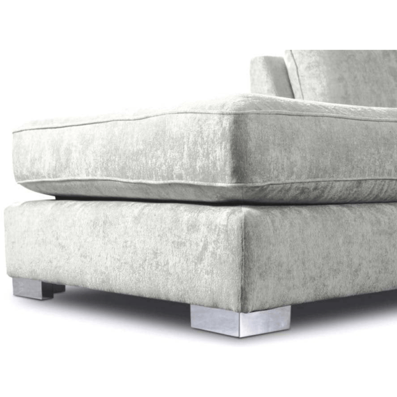 Gray fabric sofa with chrome legs on a white background