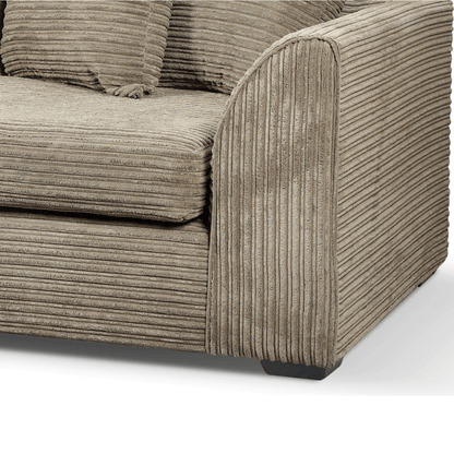 Close-up of Byron Caramel 3-Seater Sofa, tan textured upholstery detail on white background, modern and elegant design