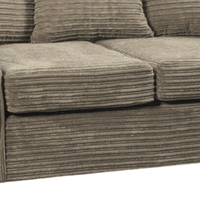 Brown textured sofa with a white background