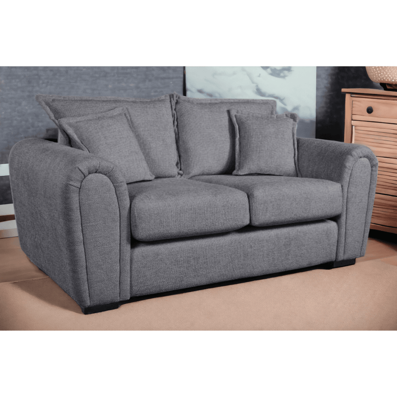 Gray sofa with cushions in a room setting