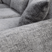 Close-up of a textured gray sofa