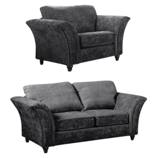 Two gray upholstered chairs on a white background