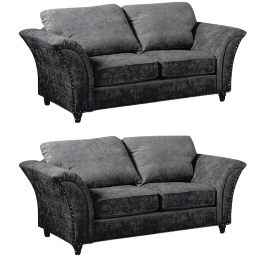 Two gray sofas shown side by side on a white background