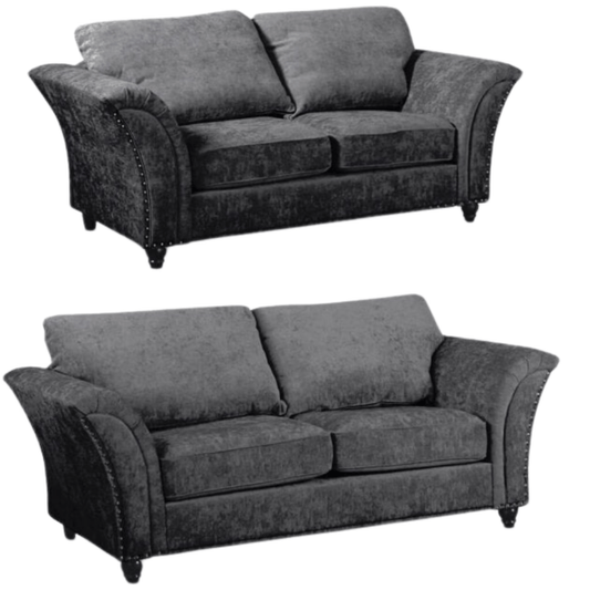Two gray sofas on a white background