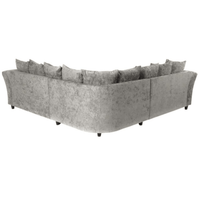 Gray sectional sofa with multiple cushions on a white background