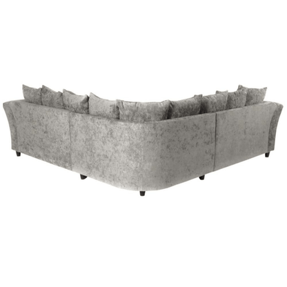 Gray sectional sofa with multiple cushions on a white background