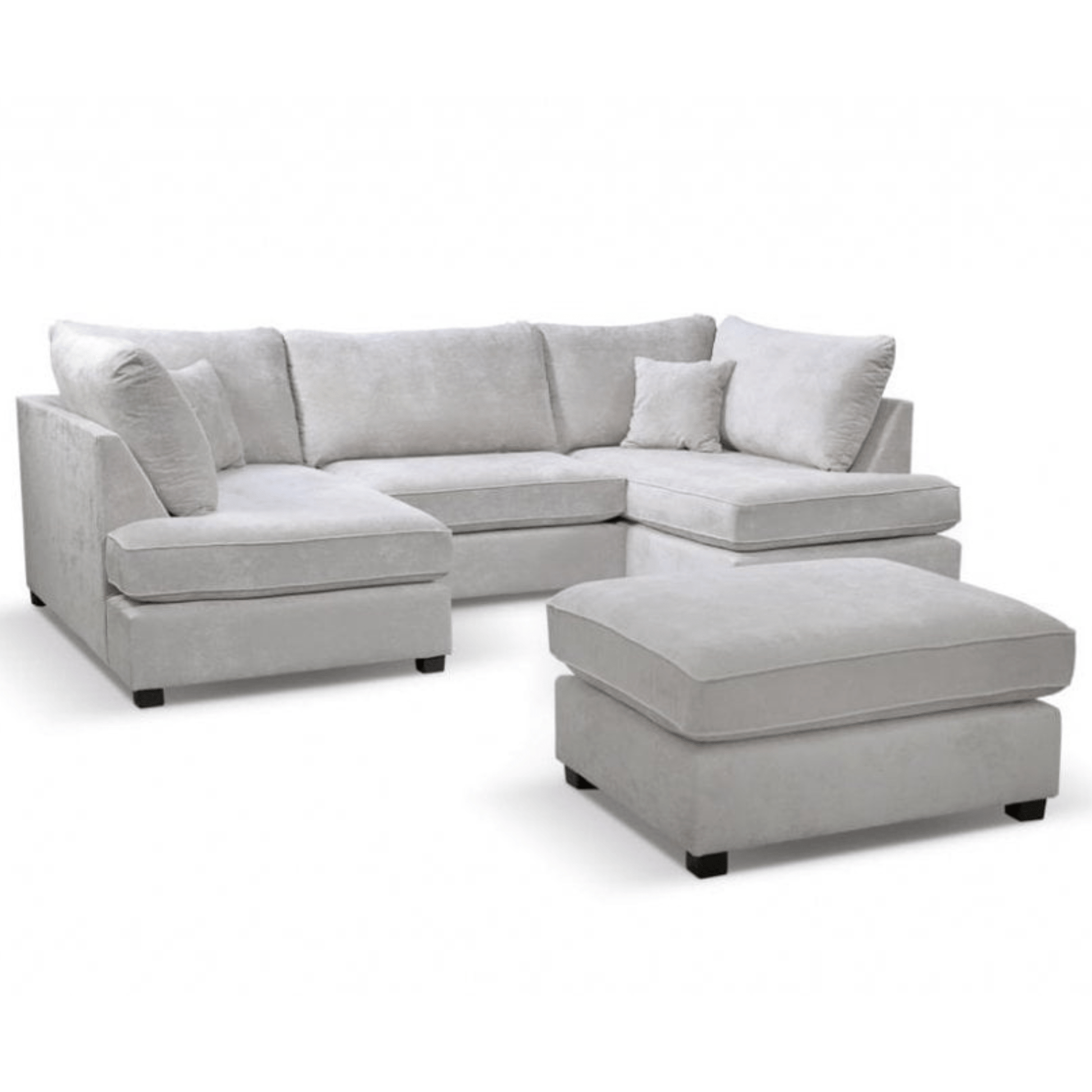 Gray sectional sofa with matching ottoman on a white background