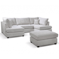 Gray sectional sofa with matching ottoman on a white background
