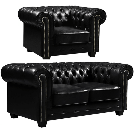 Black leather Chesterfield armchair and sofa on a white background