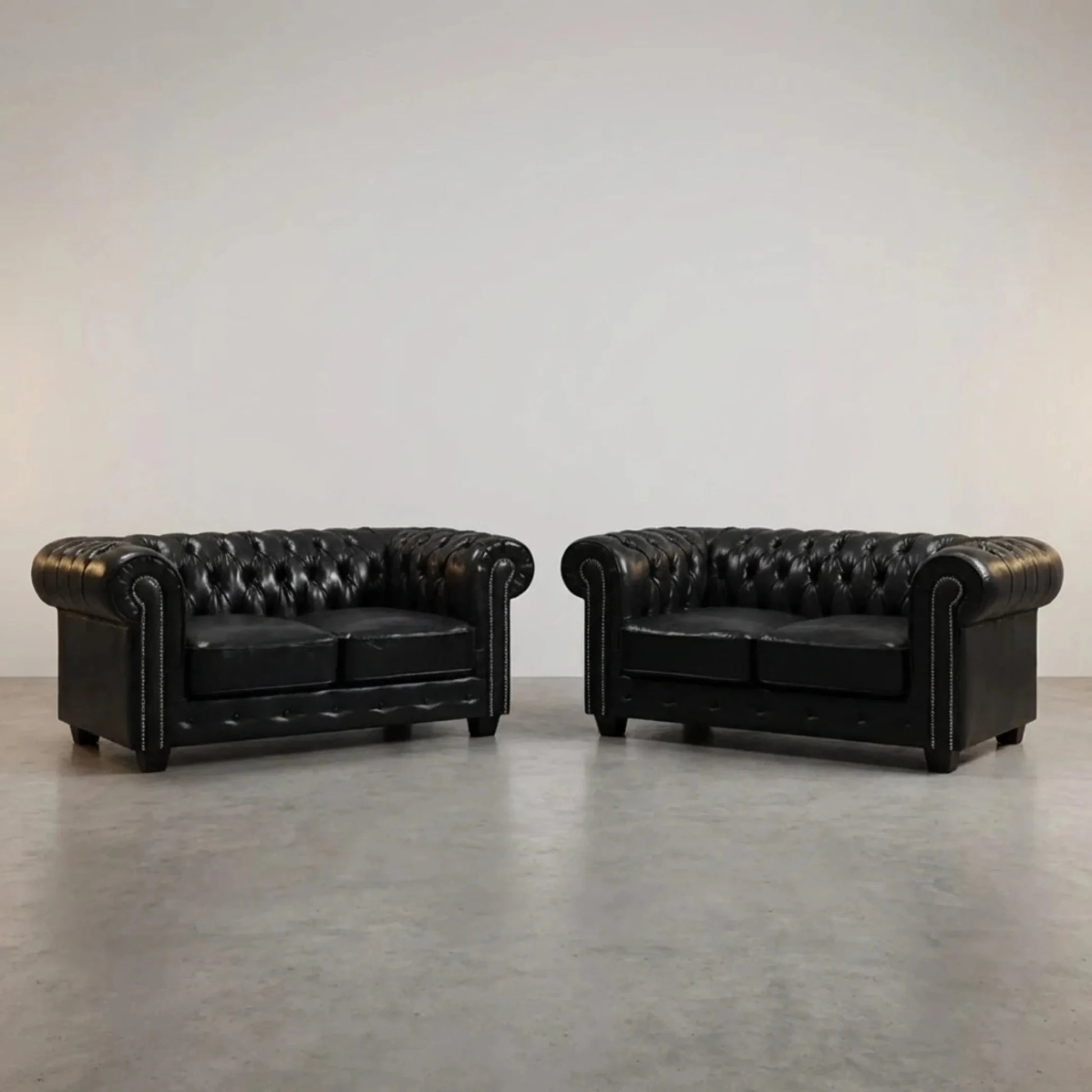 antique-black-leather-chesterfield-2-2-seater-sofa-set